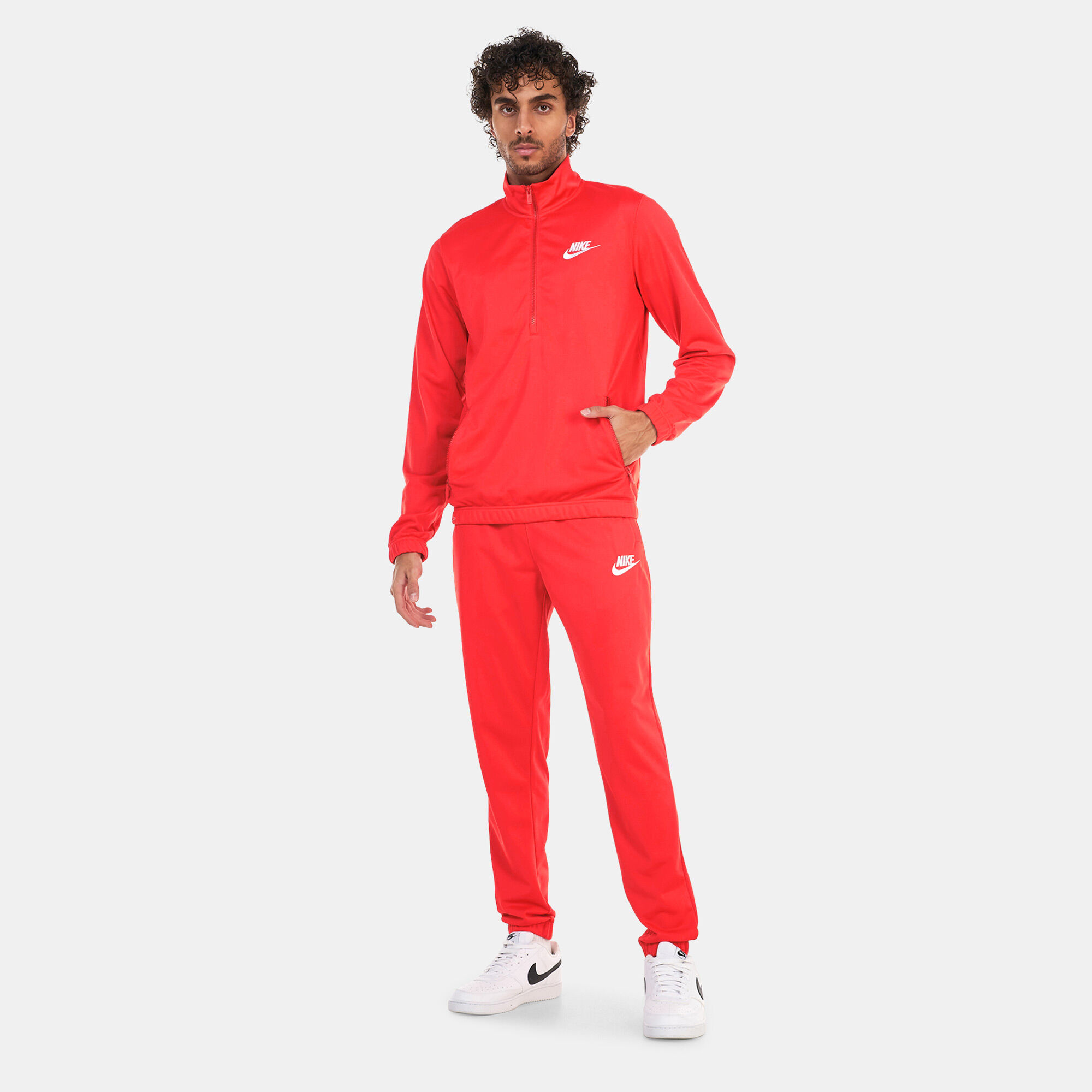 Nike essential tracksuit store