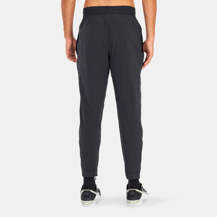 Nike Men's Dri-FIT Flex Tapered Yoga Pants Black Nike Men's Dri-FIT Flex Tapered Yoga Pants Black image number 1