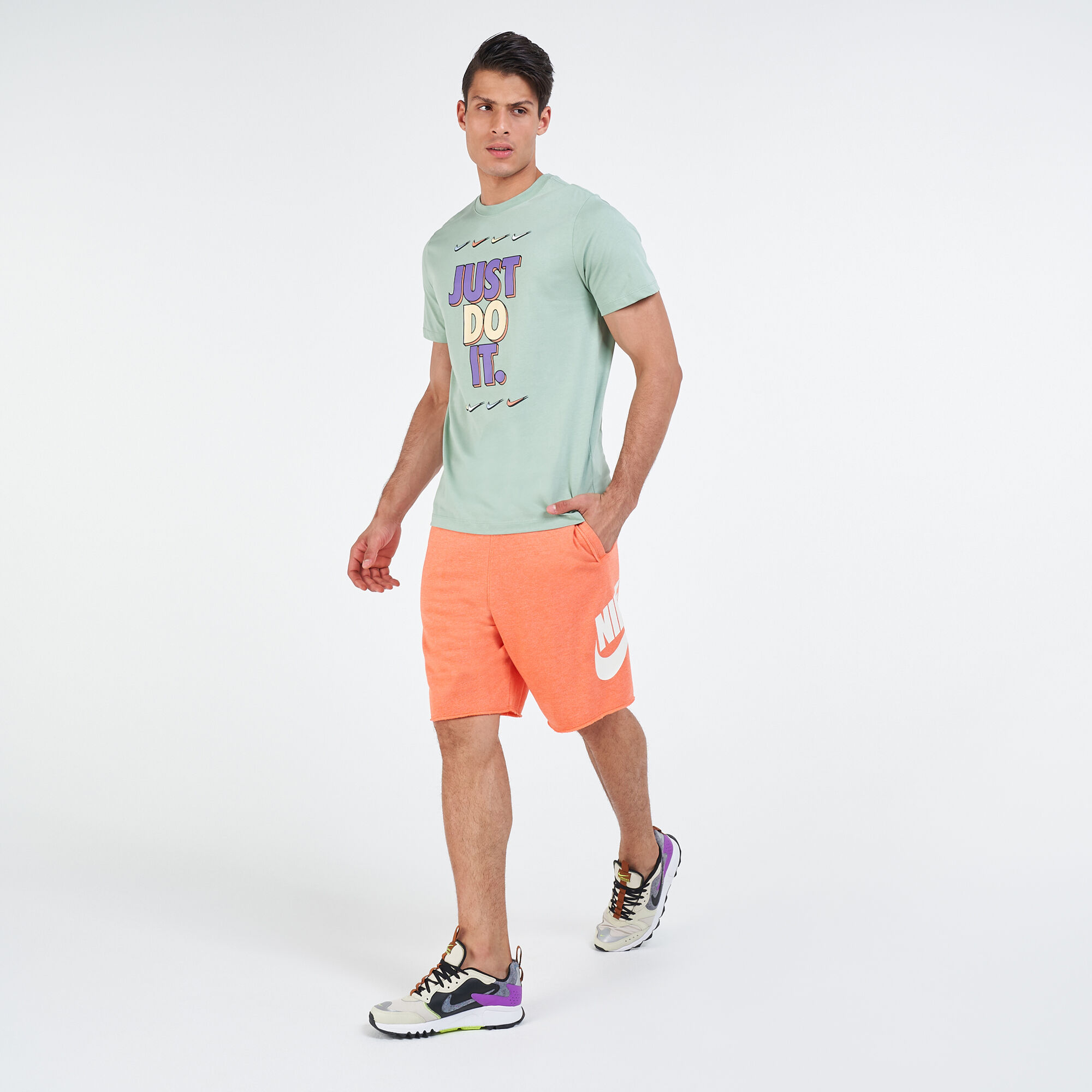 Men s Sportswear Alumni Shorts Orange Nike in Qatar SSS